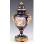 A LATE 19TH CENTURY SEVRES STYLE ORMOLU-MOUNTED VASE AND COVER on a royal blue ground with gilt