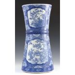 A 19TH CENTURY CHINESE BLUE AND WHITE STICK STAND decorated with Chrysanthemums and panels depicting