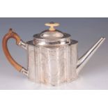 A GEORGE III SILVER ENGRAVED TEAPOT having a domed hinged lid and foliate engraved decoration with