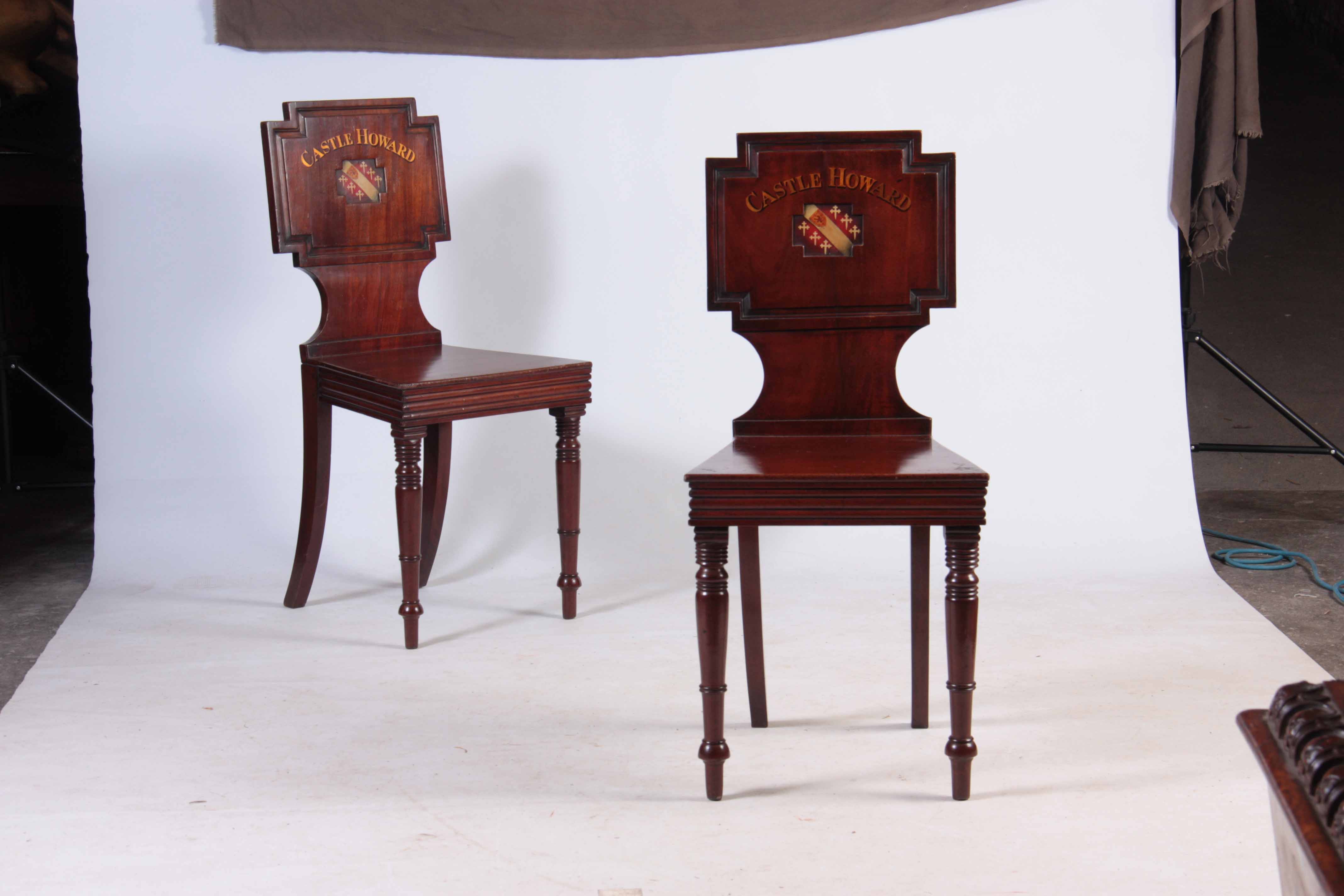 A PAIR OF LATE GEORGIAN MAHOGANY HALL CHAIRS with painted backs reading Castle Howard with coats - Image 7 of 9