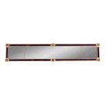 A LATE REGENCY RECTANGULAR BRASS AND COLOURED GLASS PIER OVERMANTEL MIRROR with royal blue