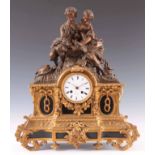 F. L. HAUSBURG, A PARIS. A LATE 19TH CENTURY FRENCH BRONZE AND ORMOLU FIGURAL MANTEL CLOCK