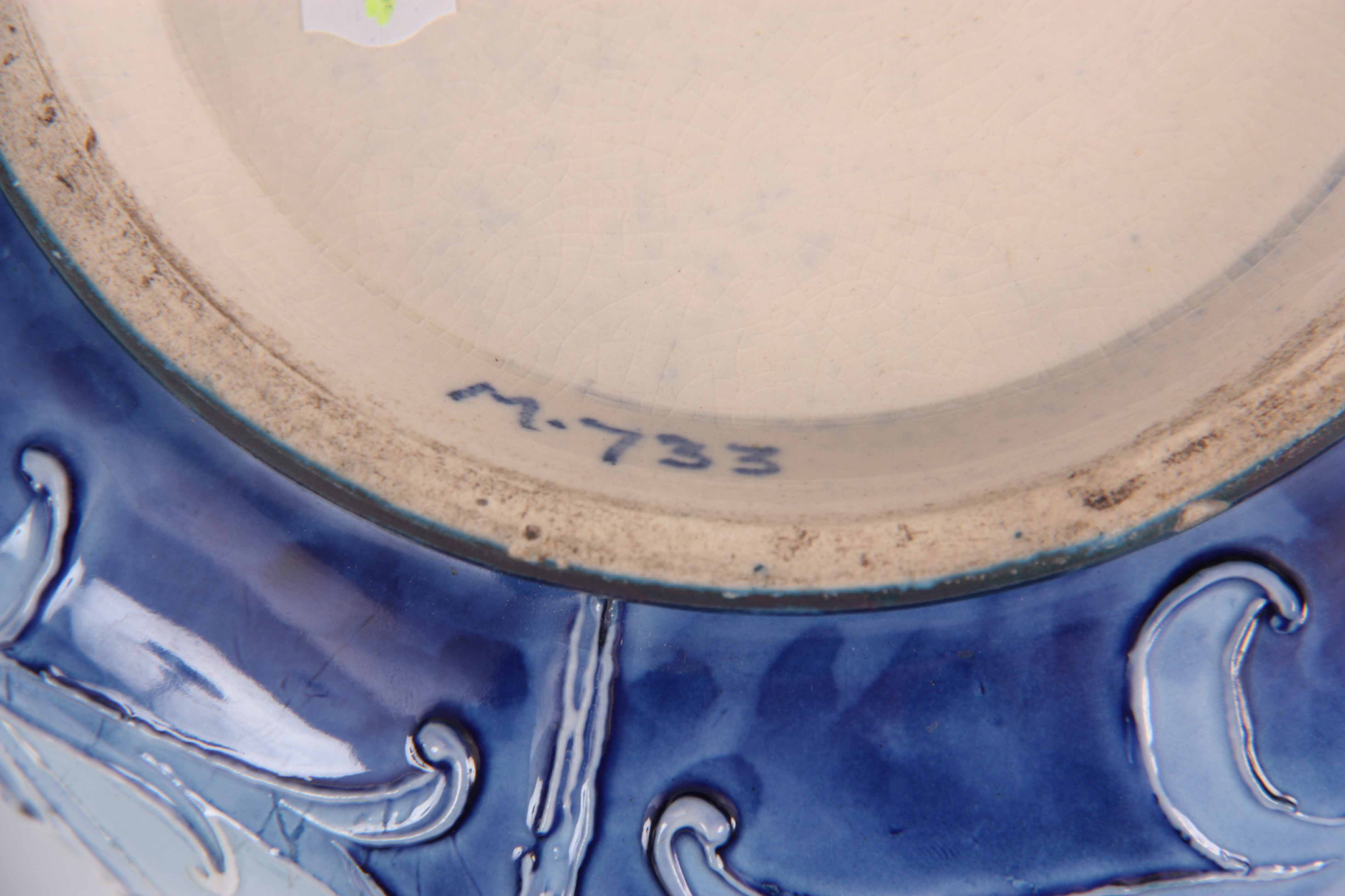 A FLORIAN WARE MOORCROFT VASE with stylised piped floral decoration with a printed label for ' - Image 6 of 6