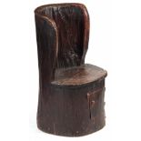 AN EARLY OAK DUG OUT SEAT with hinged door to the front and joined elm seat 98cm high