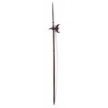 A LATE 16TH/EARLY 17TH CENTURY GERMAN HALBERD the riveted iron axehead with a long spike on pine