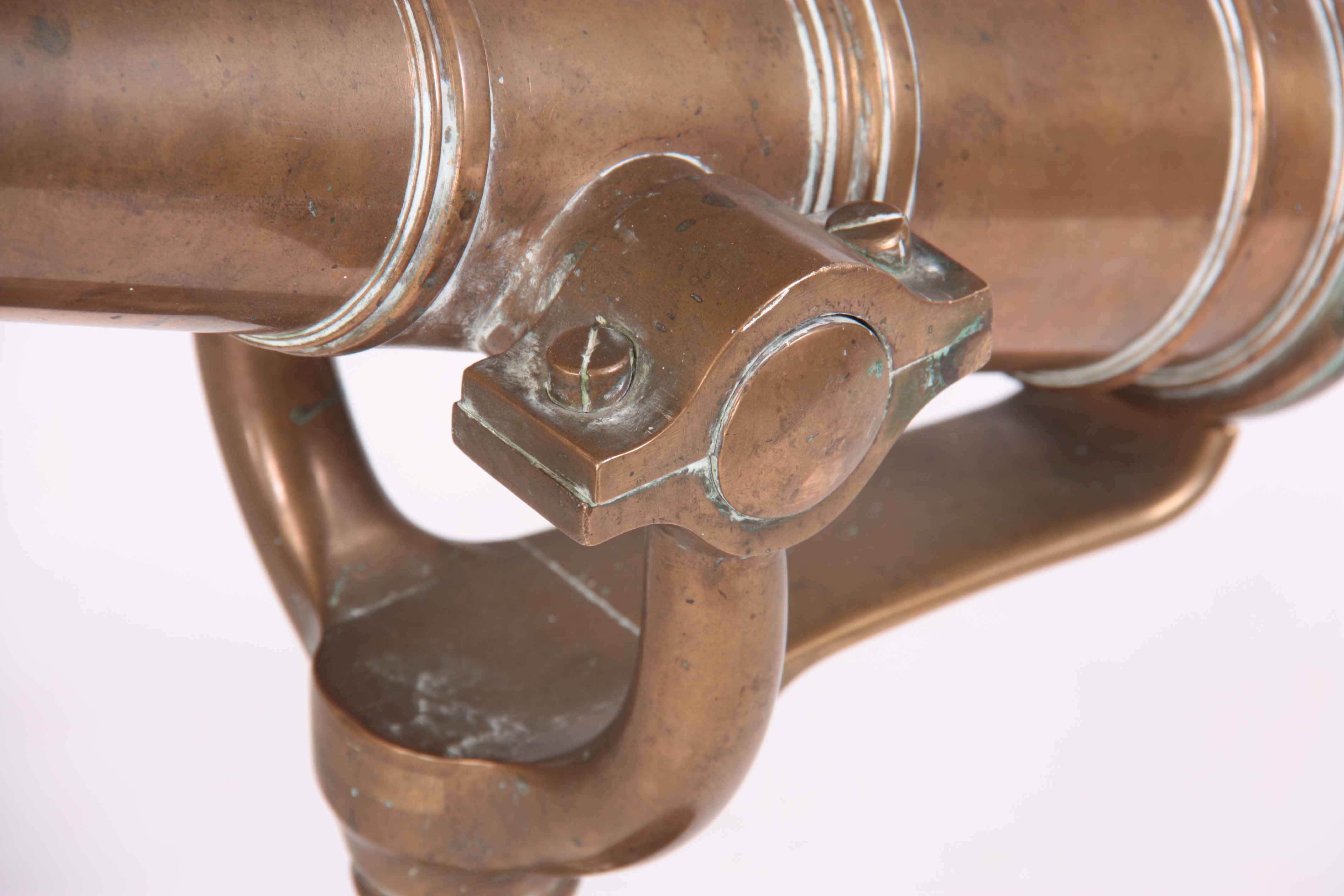 A 19th CENTURY BRONZE SIGNAL CANON mounted on mahogany turned base, 60cm long, 64cm high - Image 3 of 8