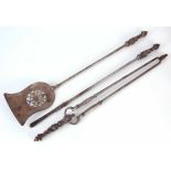 A GOOD SET OF EARLY 19th CENTURY STEEL FIRE IRONS with unusual stylised entwined dolphin handles,