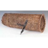 AN EARLY 20th CENTURY BRACKET MOUNTED WICKER UMBRELLA HOLDER originally fitted to a vintage motorcar