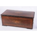 A 19TH CENTURY MUSICAL BOX MADE FOR THE CHINESE EXPORT MARKET the rosewood case with marquetry