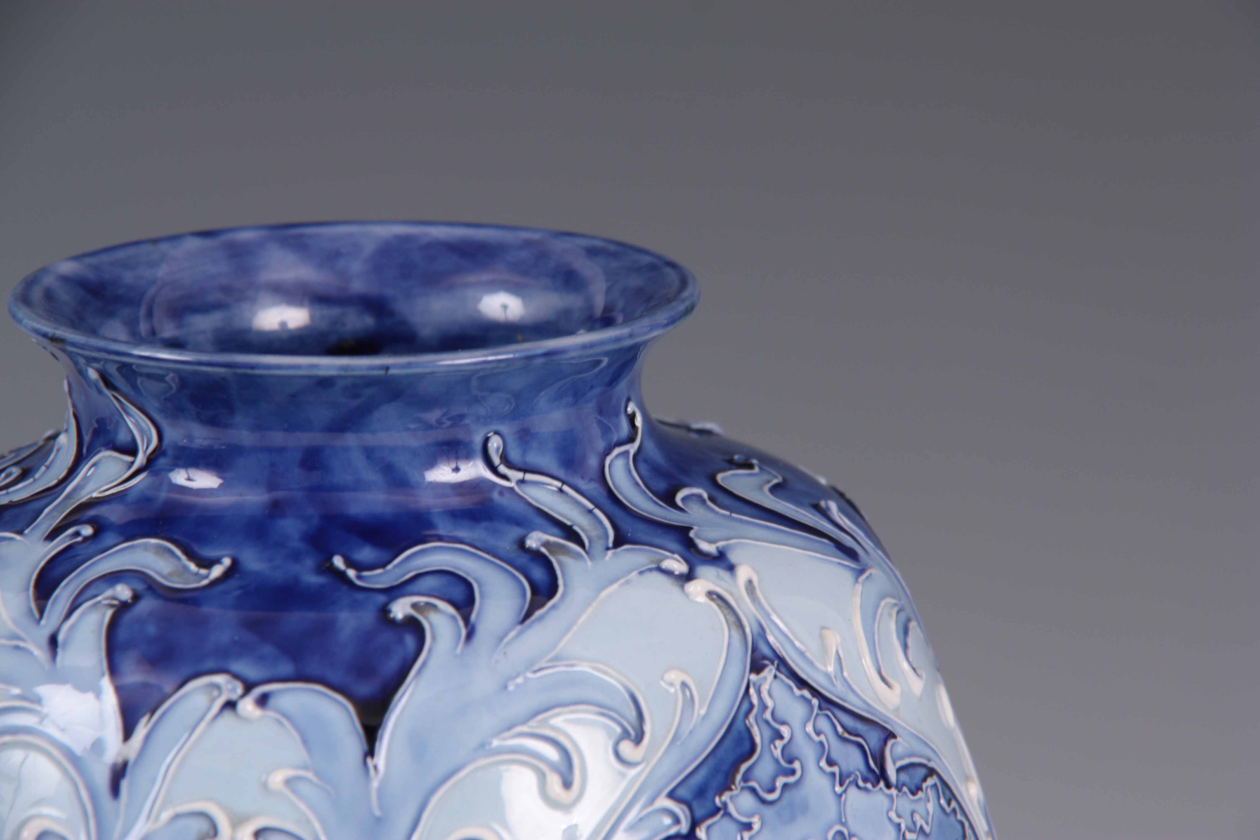 A FLORIAN WARE MOORCROFT VASE with stylised piped floral decoration with a printed label for ' - Image 3 of 6