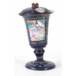 19TH CENTURY CANTON ENAMEL LIDDED CUP decorated with panels of garden and boating scenes on a