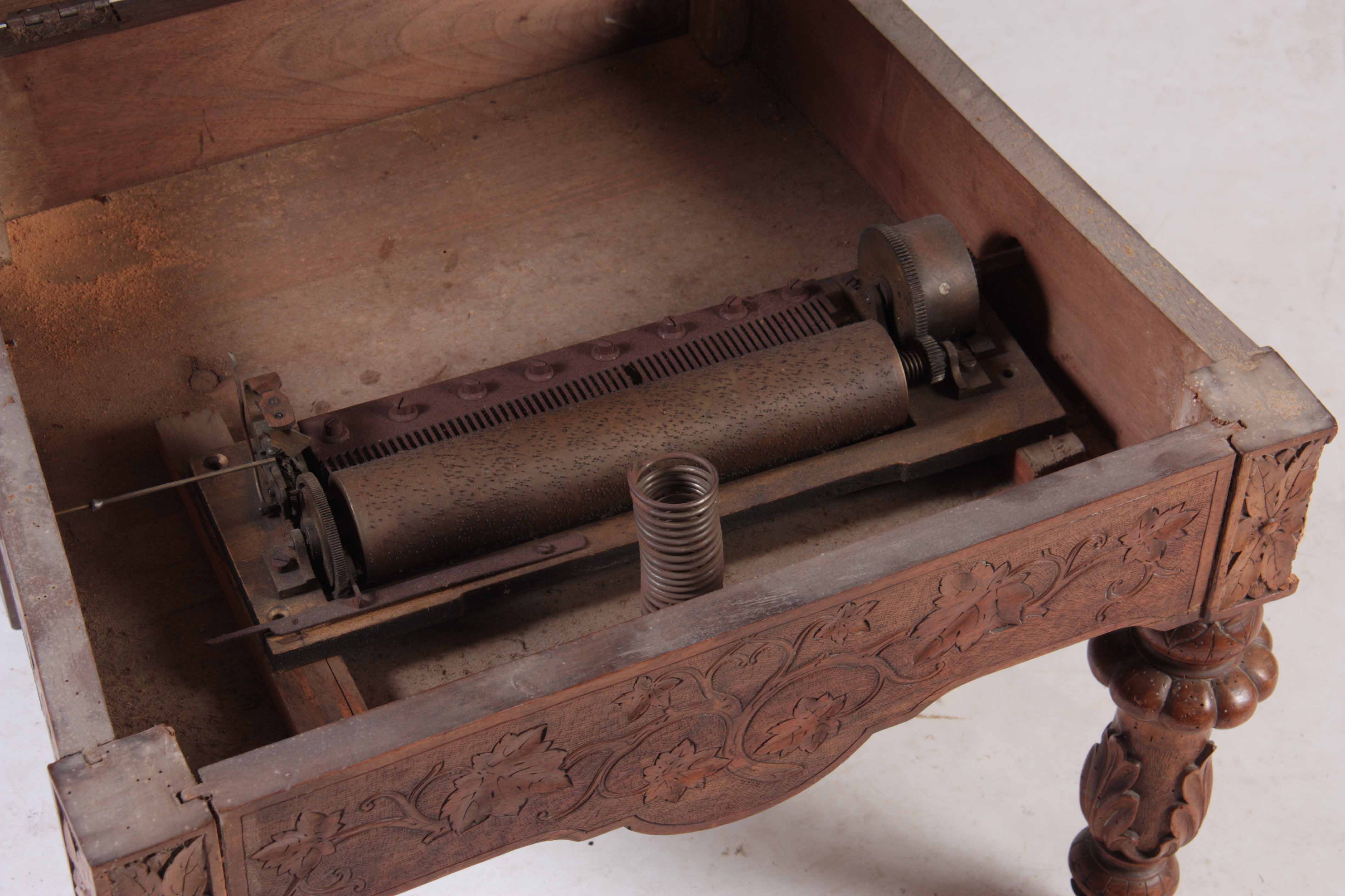 A 19TH CENTURY WALNUT BLACK FOREST MUSICAL ARMCHAIR with marquetry inlaid panels surrounded by - Image 8 of 8