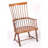 A 19TH CENTURY SCOTTISH ASH AND WALNUT COMB BACK WINDSOR CHAIR possibly from Ayrshire with dished