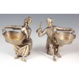 A PAIR OF LATE 19th CENTURY SILVER GILT FIGURAL SALTS modelled as two classical figures in 18TH