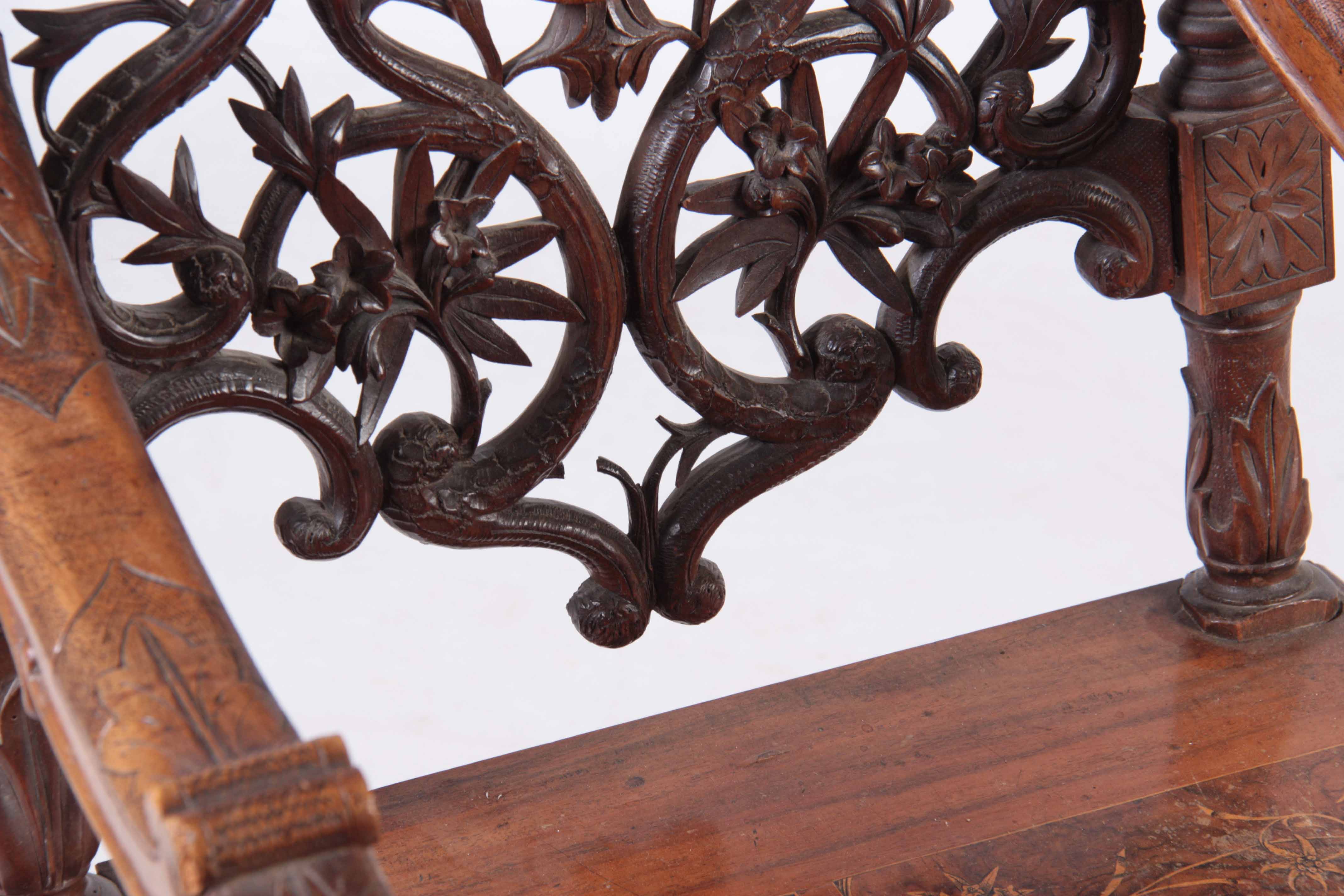 A 19TH CENTURY WALNUT BLACK FOREST MUSICAL ARMCHAIR with marquetry inlaid panels surrounded by - Image 6 of 8