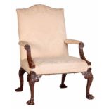 A FINE GEORGE III CARVED MAHOGANY GAINSBOROUGH CHAIR OF GENEROUS SIZE having a camel shaped back,