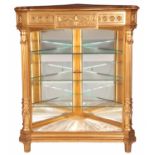 A 19TH CENTURY FRENCH GILT GESSO CORNER DISPLAY CABINET with relief carved moulded frieze above