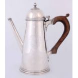 A QUEEN ANN SILVER COFFEE POT, POSSIBLY IRISH having a domed hinged lid on tapering body and