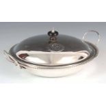 A GEORGE III SILVER HASH DISH with domed lid and loop side handle 25cm diameter, app. 28 troy