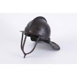 AN MID 18TH CENTURY ENGLISH LOBSTER TAILED HELMET