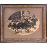 A LARGE EARLY 20th CENTURY OVAL PHOTOGRAPHIC FRAMED PRINT depicting a lady seated in an early