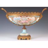 AN IMPRESSIVE LATE 19TH/EARLY 20TH CENTURY GILT METAL MOUNTED SEVRES STYLE OVAL CENTREPIECE the