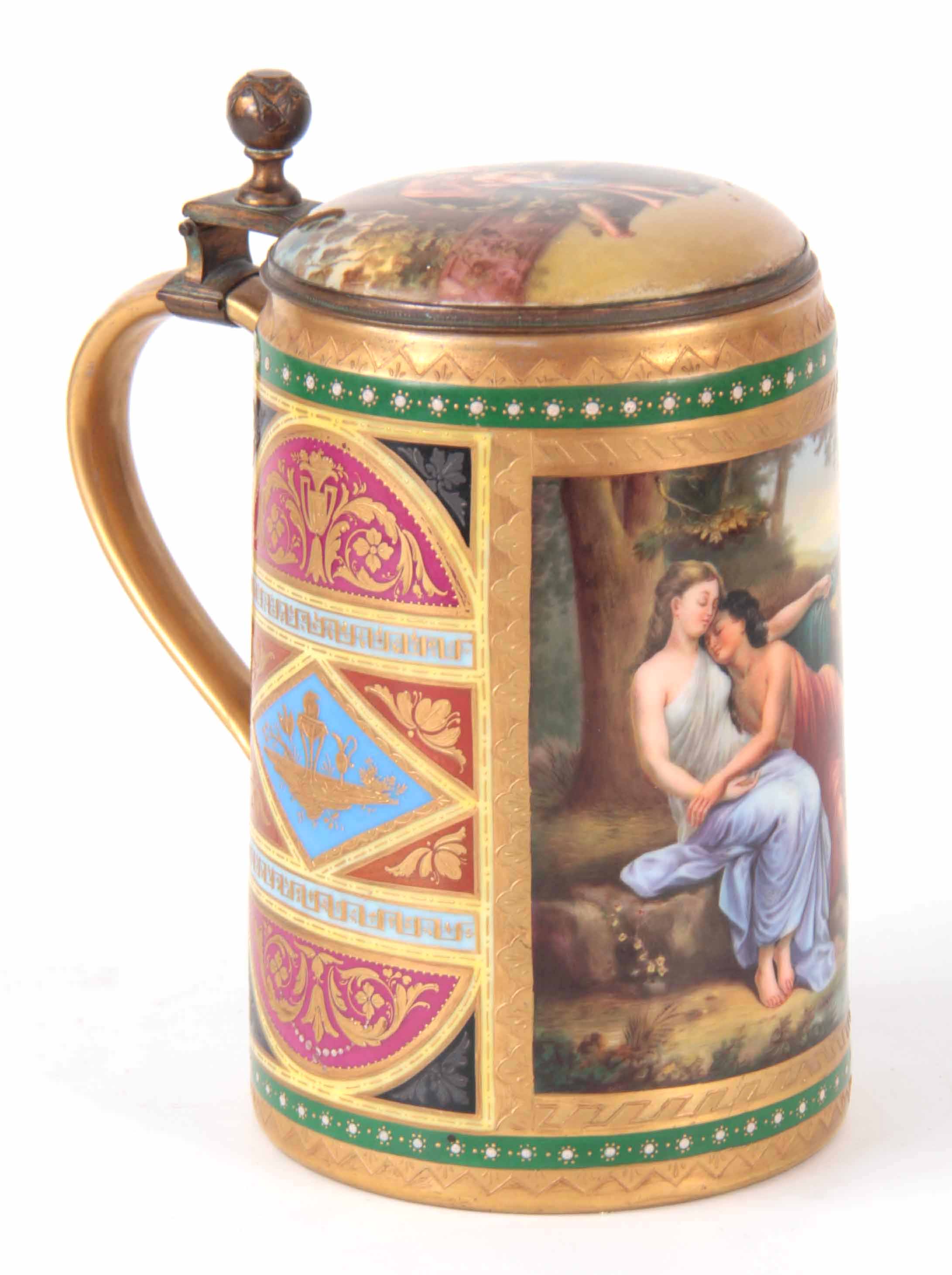 AN EARLY 20TH CENTURY ROYAL VIENNA PORCELAIN LIDDED TANKARD “Amor u. Psyche” with gilt metal front