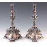 A PAIR OF 19TH CENTURY SILVER PLATED CENTREPIECES /CANDLESTICKS IN THE STYLE OF CHRISTOPHER DRESSER,