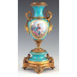 A 19TH CENTURY FRENCH SEVRES ORMOLU MOUNTED PORCELAIN VASE with powder blue ground having gilt and