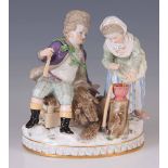 A 19TH CENTURY MEISSEN PORCELAIN FIGURE GROUP OF A WOODCUTTER AND FLOWER PICKER resting on a