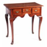 AN UNUSUAL SOLID WALNUT EARLY 18TH CENTURY LOWBOY POSSIBLY AMERICAN with moulded edge top above