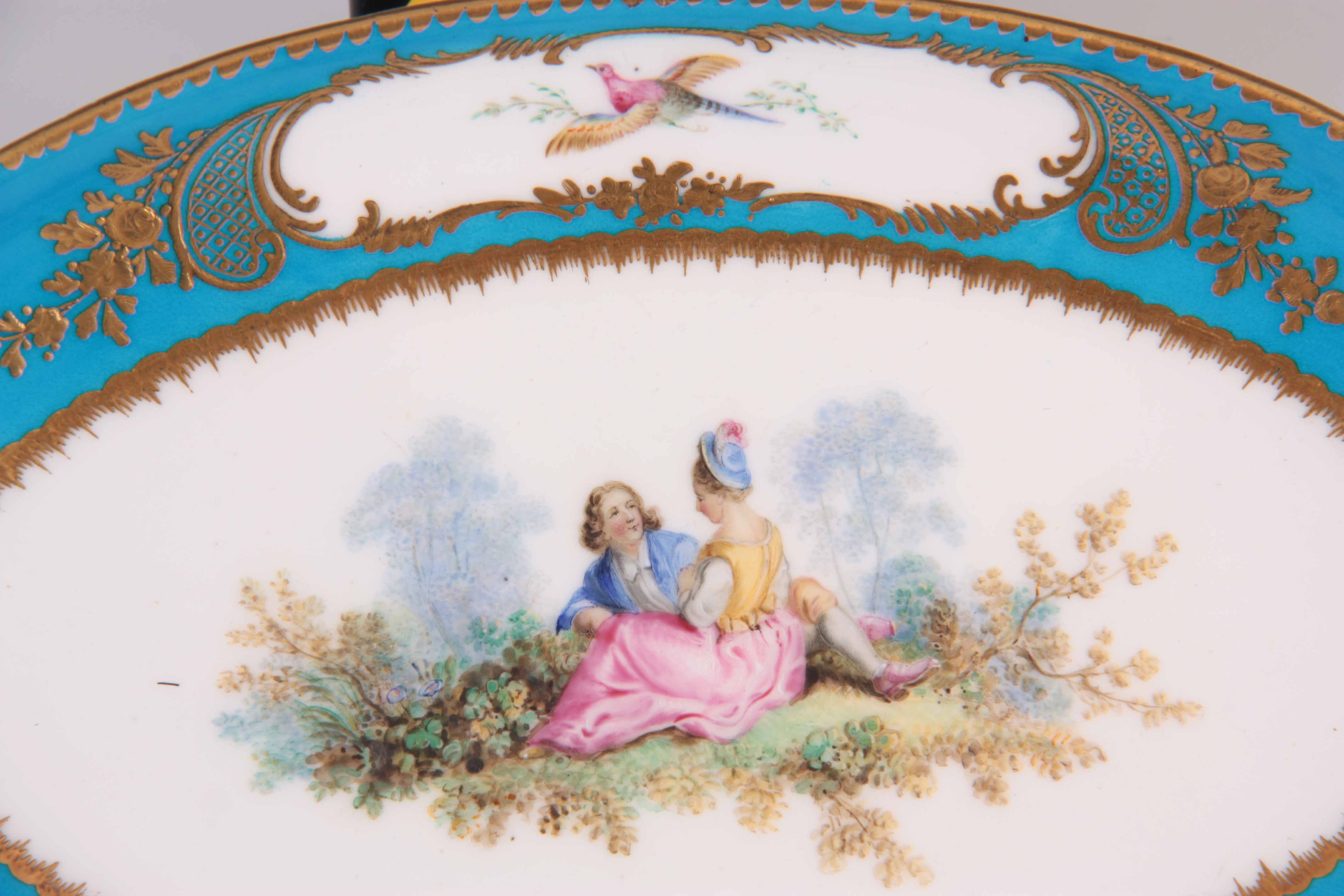 A FINE 18TH CENTURY SEVRES PORCELAIN SHALLOW OVAL DISH on a gilded celestial blue ground decorated - Image 3 of 5