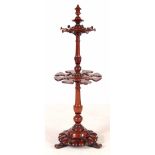 AN EARLY VICTORIAN MAHOGANY BOOT AND WHIP STAND IN THE MANOR OF GILLOWS with turned tapering bulbous