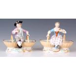 A PAIR OF 19TH CENTURY MEISSEN PORCELAIN TABLE SALTS depicting a young boy and girl sat between