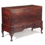 AN EARLY 18TH CENTURY ELM SILVER CHEST ON STAND having superb colour and patina, the D moulded