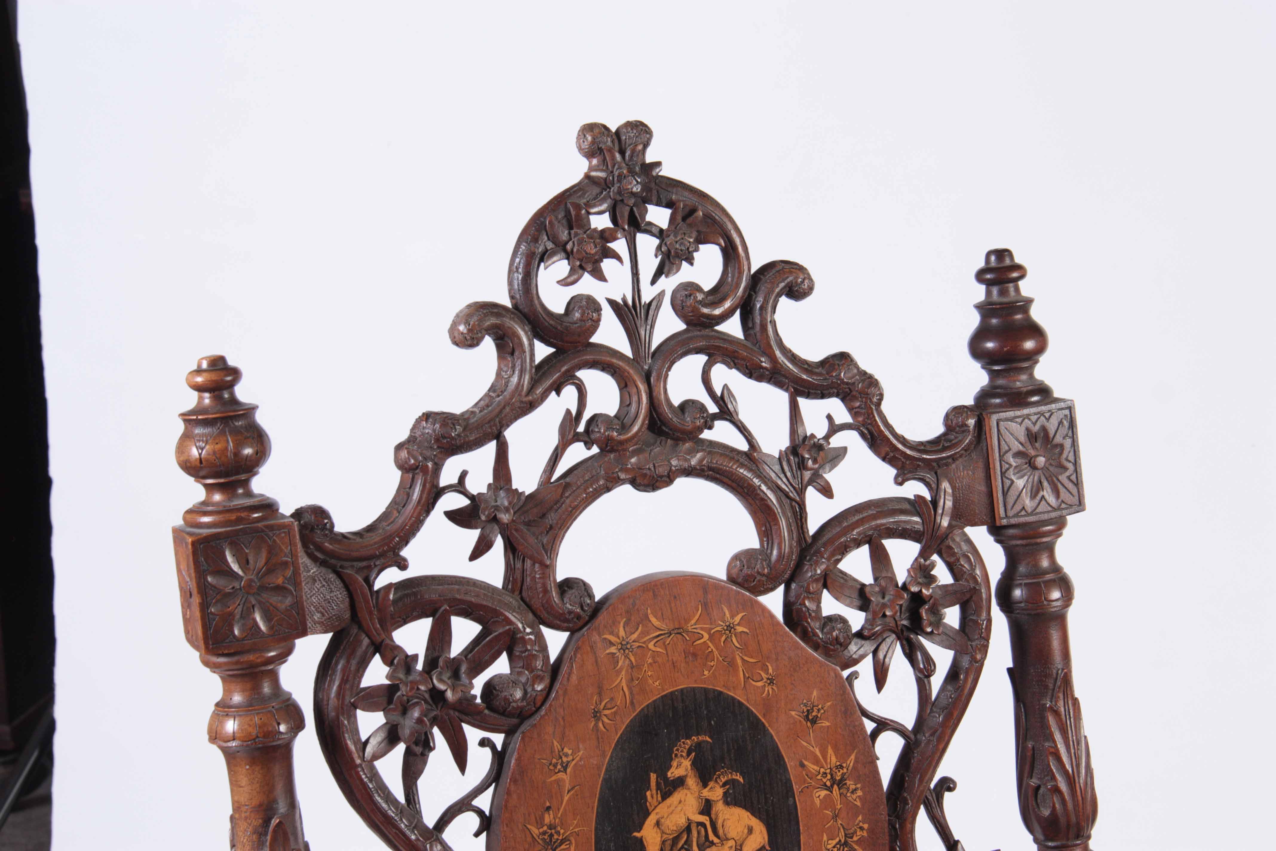 A 19TH CENTURY WALNUT BLACK FOREST MUSICAL ARMCHAIR with marquetry inlaid panels surrounded by - Image 4 of 8