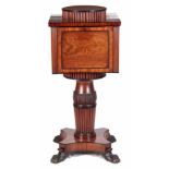 A REGENCY MAHOGANY PEDESTAL WINE COOLER / CELLARETTE IN THE MANNER OF THOMAS HOPE with reeded