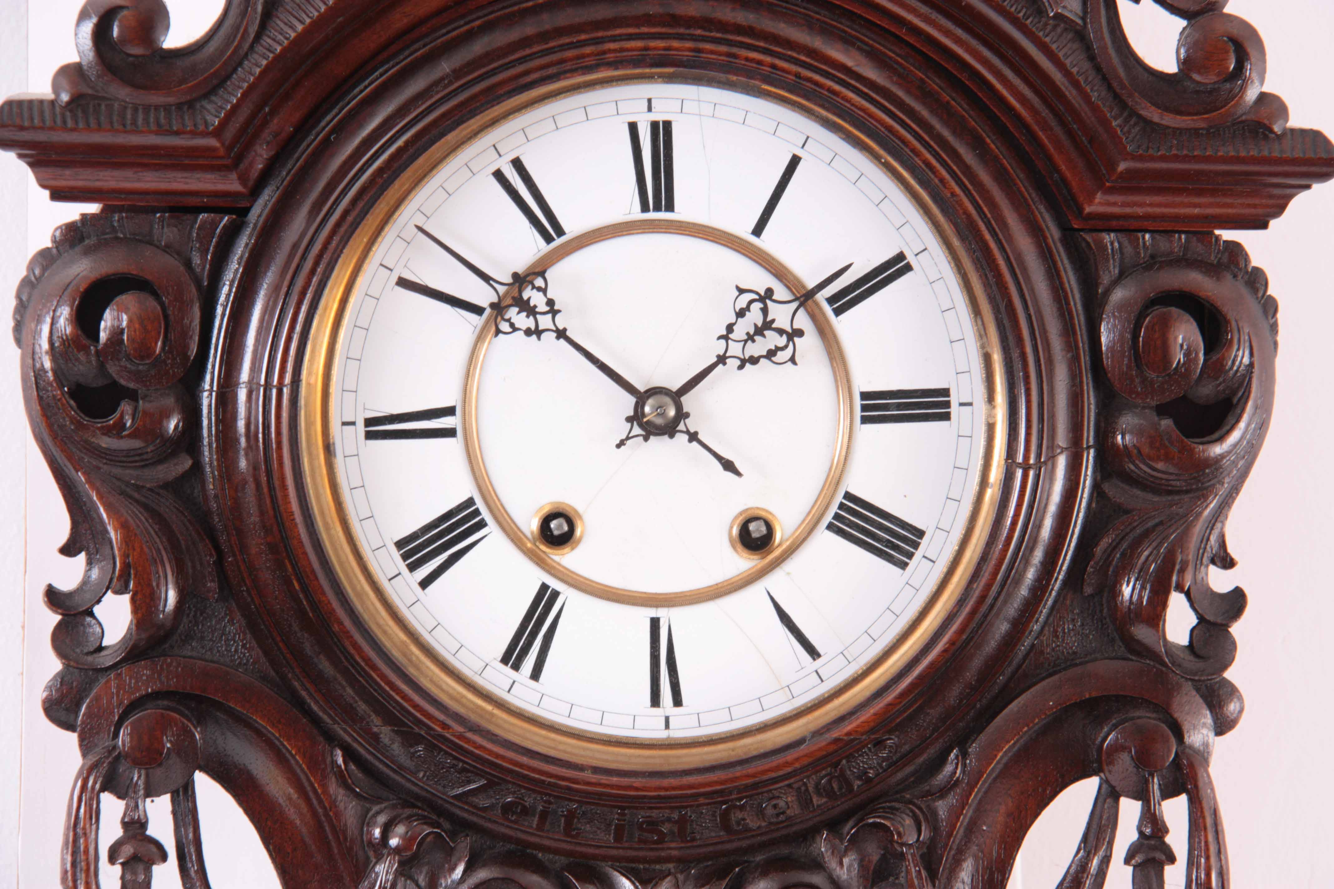 LENZKIRCH. A LATE 19TH CENTURY GERMAN VIENNA STYLE WALL CLOCK the mahogany serpentine case profusely - Image 2 of 6