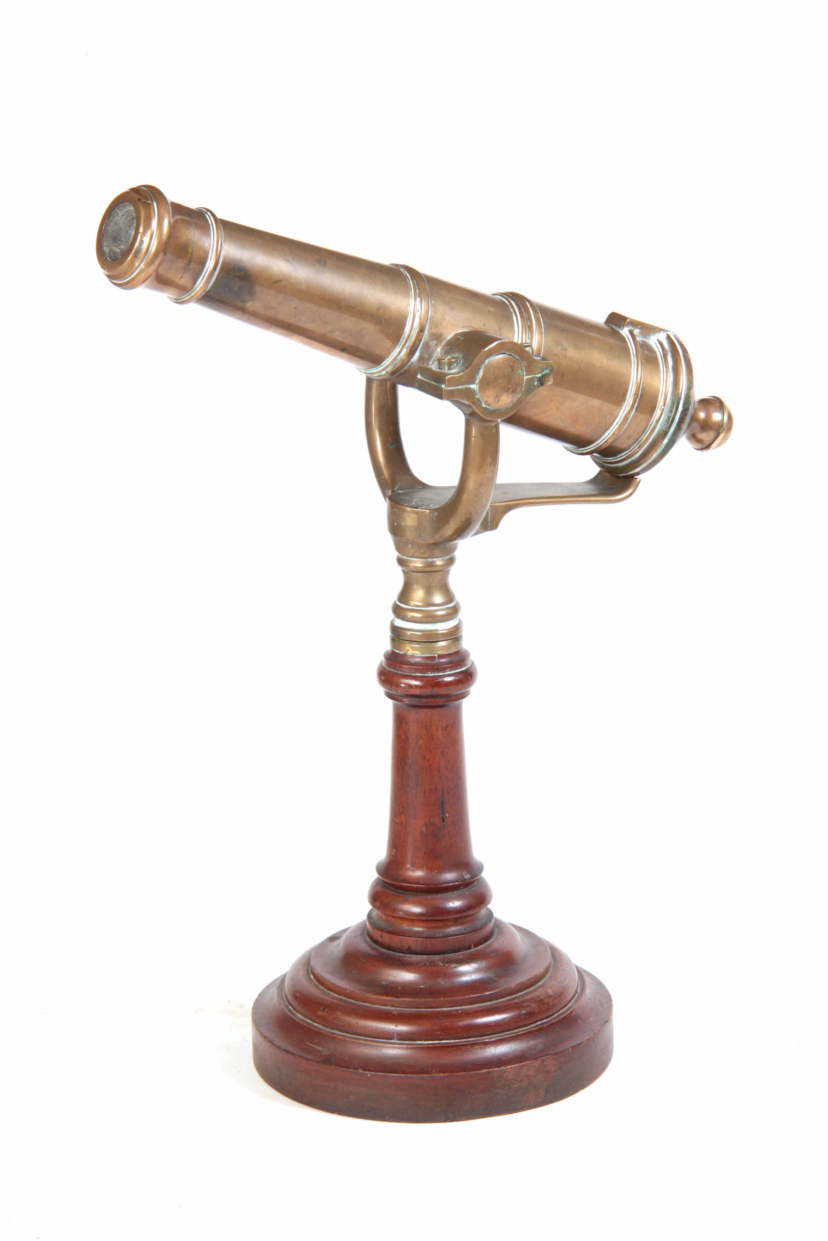 A 19th CENTURY BRONZE SIGNAL CANON mounted on mahogany turned base, 60cm long, 64cm high