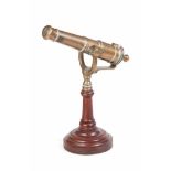 A 19th CENTURY BRONZE SIGNAL CANON mounted on mahogany turned base, 60cm long, 64cm high