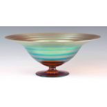 A 20TH CENTURY WMF IKORA GLASS IRIDESCENT FOOTED BOWL BY KARL WIEDEMANN 11cm high, 28cm diameter.