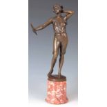 BRUNO ZACH. AN EARLY 20TH CENTURY AUSTRIAN BRONZE SCULPTURE modelled as a young woman looking into a