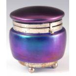 A FERDINAND VON POSHINGER IRIDESCENT GLASS LIDDED POT with silver plated mounts standing on three