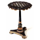 A VICTORIAN GILT DECORATED AND MOTHER OF PEARL INLAID GAMES TABLE the circular scallop-edge hinged