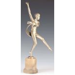 A 1930S ART DECO SILVER PATINATED FIGURE OF A SCARF DANCER in the manner of Lorenzl standing on a