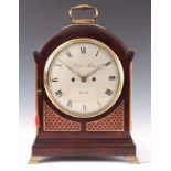 WILLIAM RUST, HULL. A REGENCY FIGURED MAHOGANY PAD TOP BRACKET CLOCK the break arch case having gilt