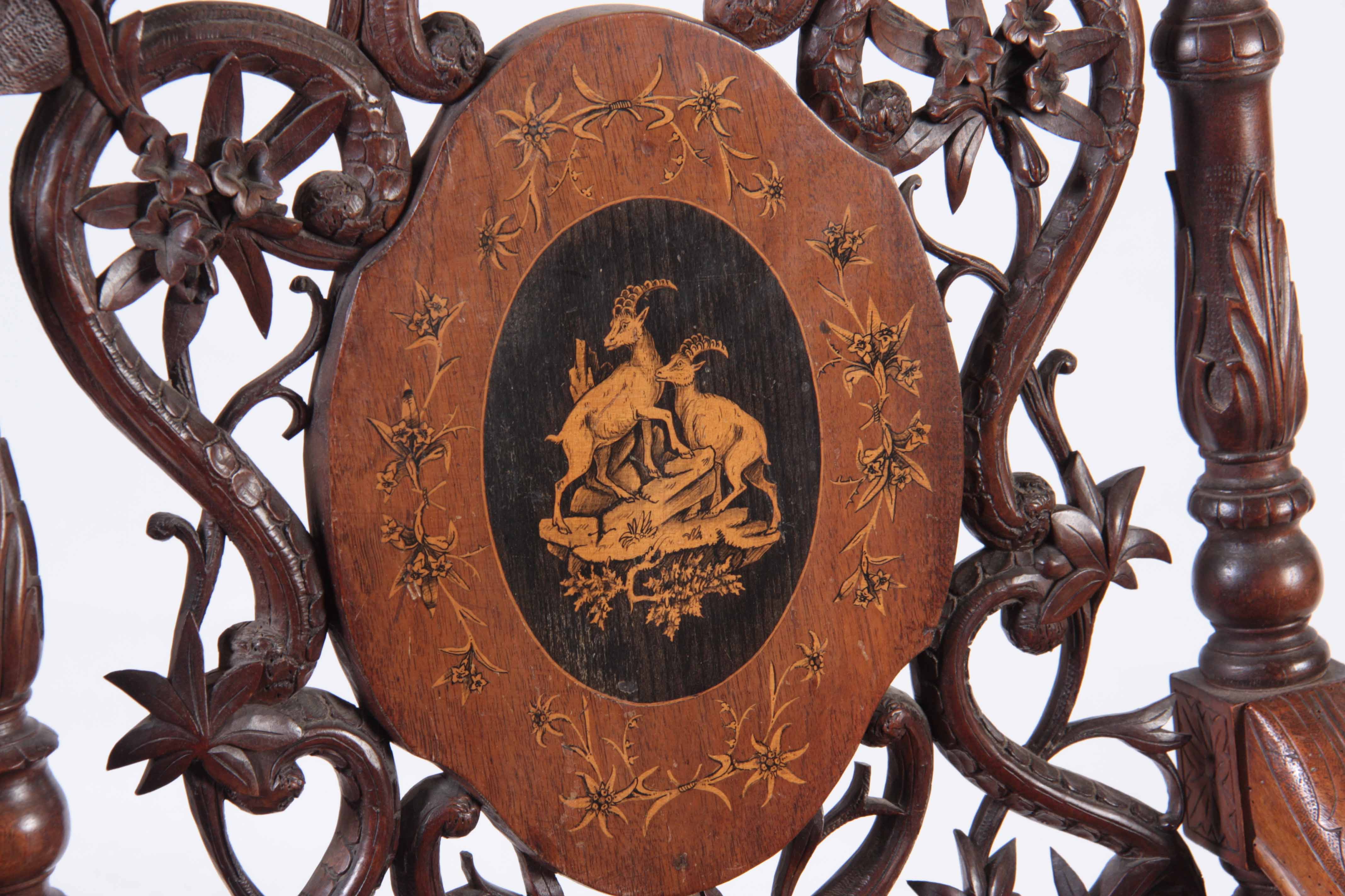 A 19TH CENTURY WALNUT BLACK FOREST MUSICAL ARMCHAIR with marquetry inlaid panels surrounded by - Image 5 of 8