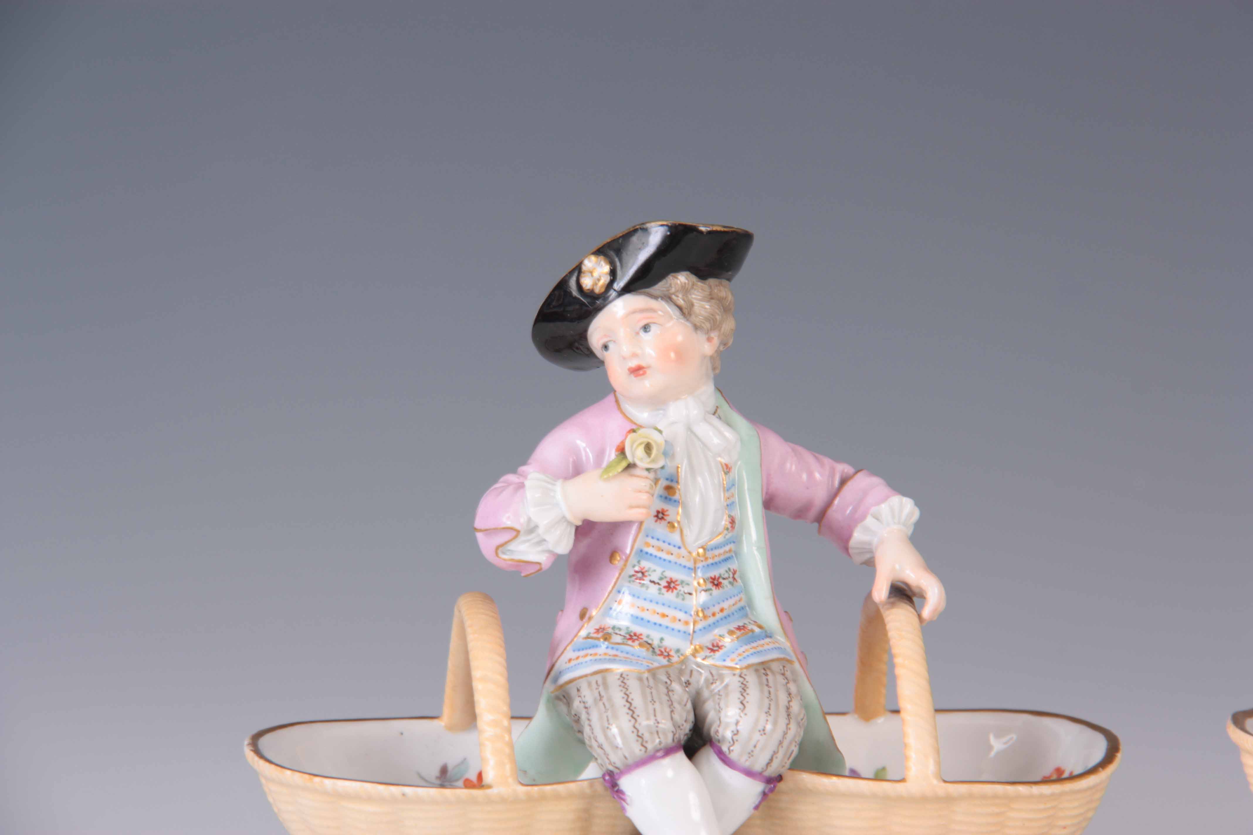 A PAIR OF 19TH CENTURY MEISSEN PORCELAIN TABLE SALTS depicting a young boy and girl sat between - Image 2 of 5