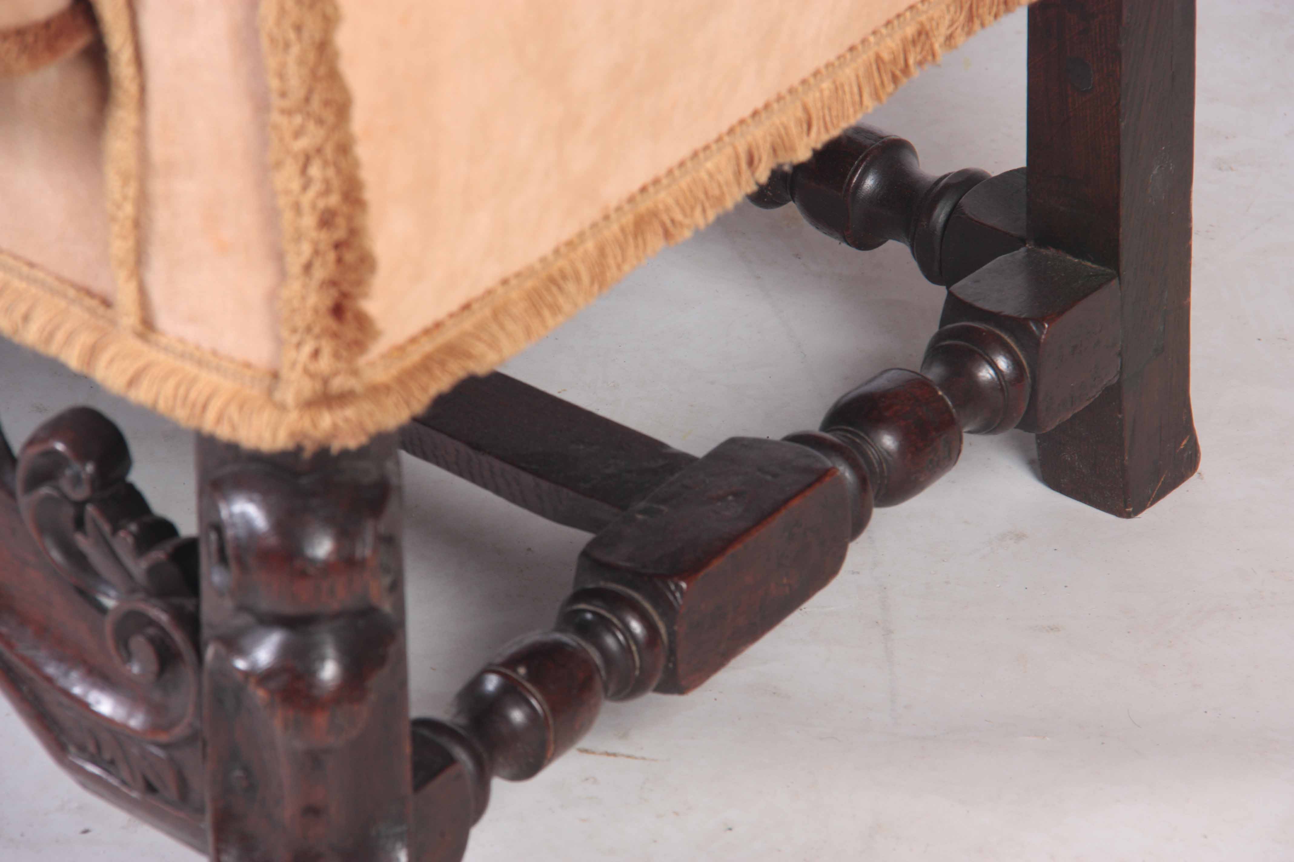 A 17TH CENTURY OAK WINGBACK ARMCHAIR with upholstered back, scrolled arms and loose cushion; - Image 3 of 4