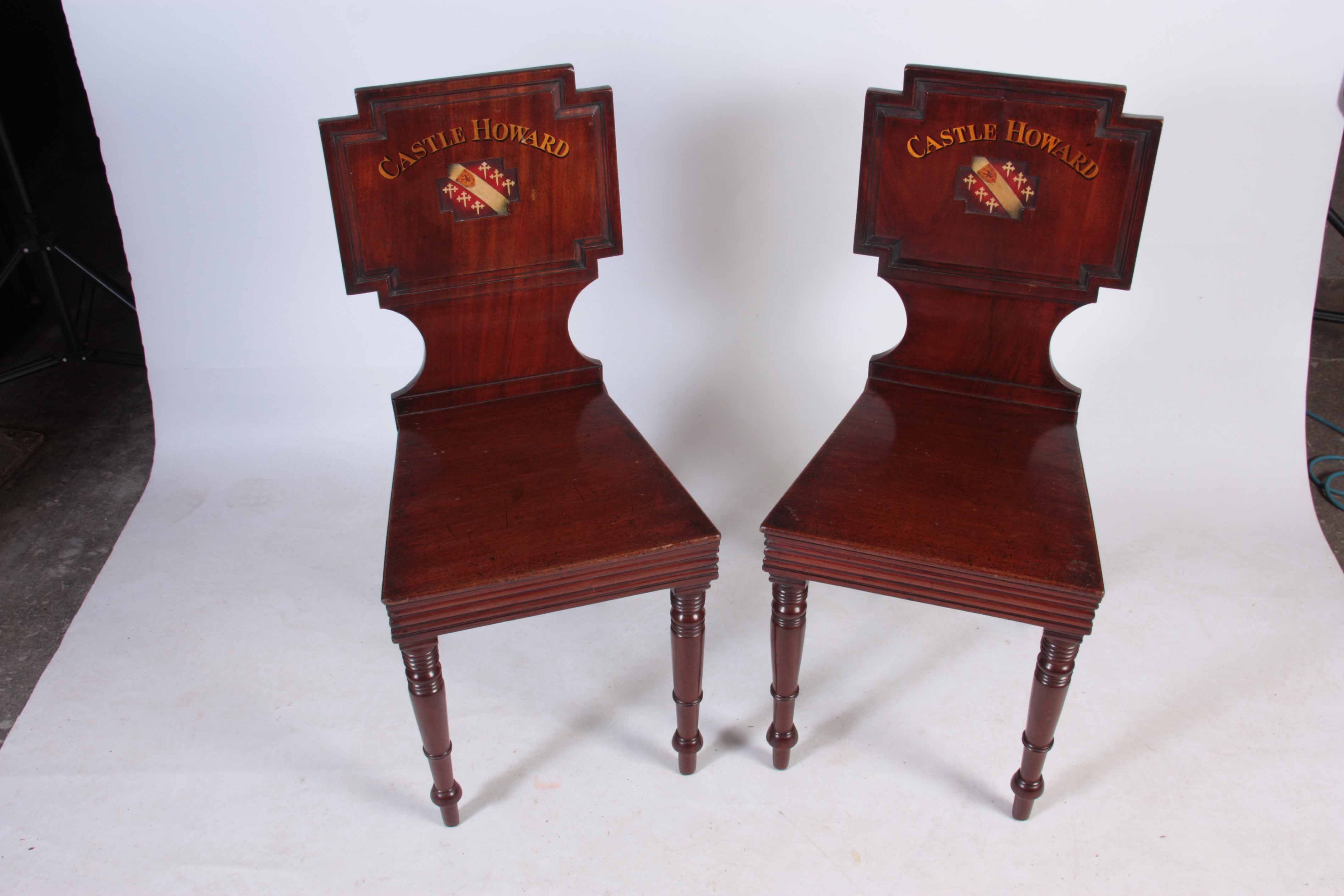 A PAIR OF LATE GEORGIAN MAHOGANY HALL CHAIRS with painted backs reading Castle Howard with coats - Image 6 of 9